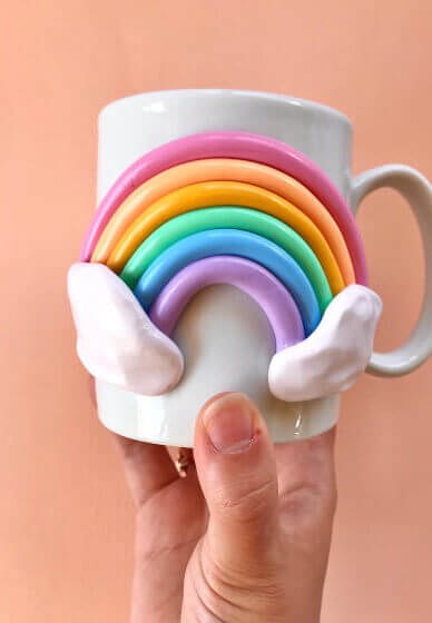 3D rainbow design on mug using polymer clay.