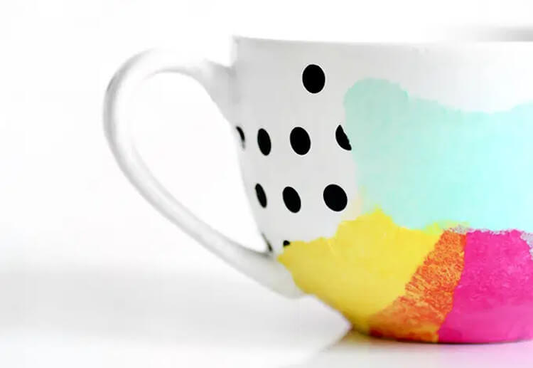 Tissue paper combine with Mod Padge to create multicoloued mug design. 